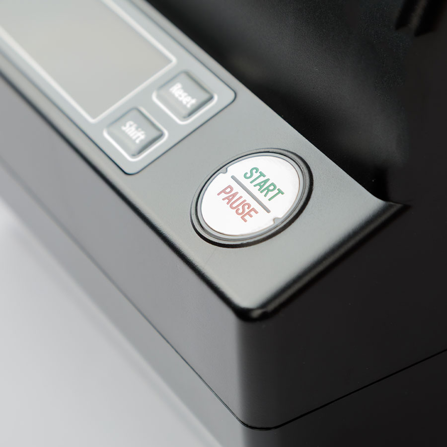 Detail van de startknop van de Hawkmatic HK-6