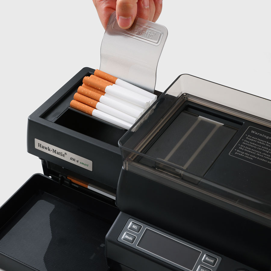 King Size hulzen plaatsen in de geïntegreerde hulzenhouder van de Hawkmatic HK-6